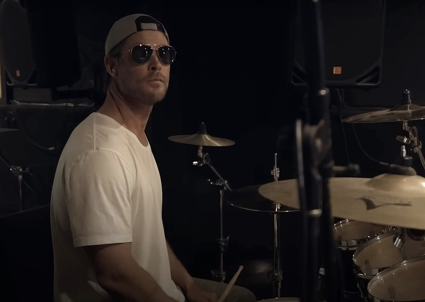 Chris Hemsworth plays drums