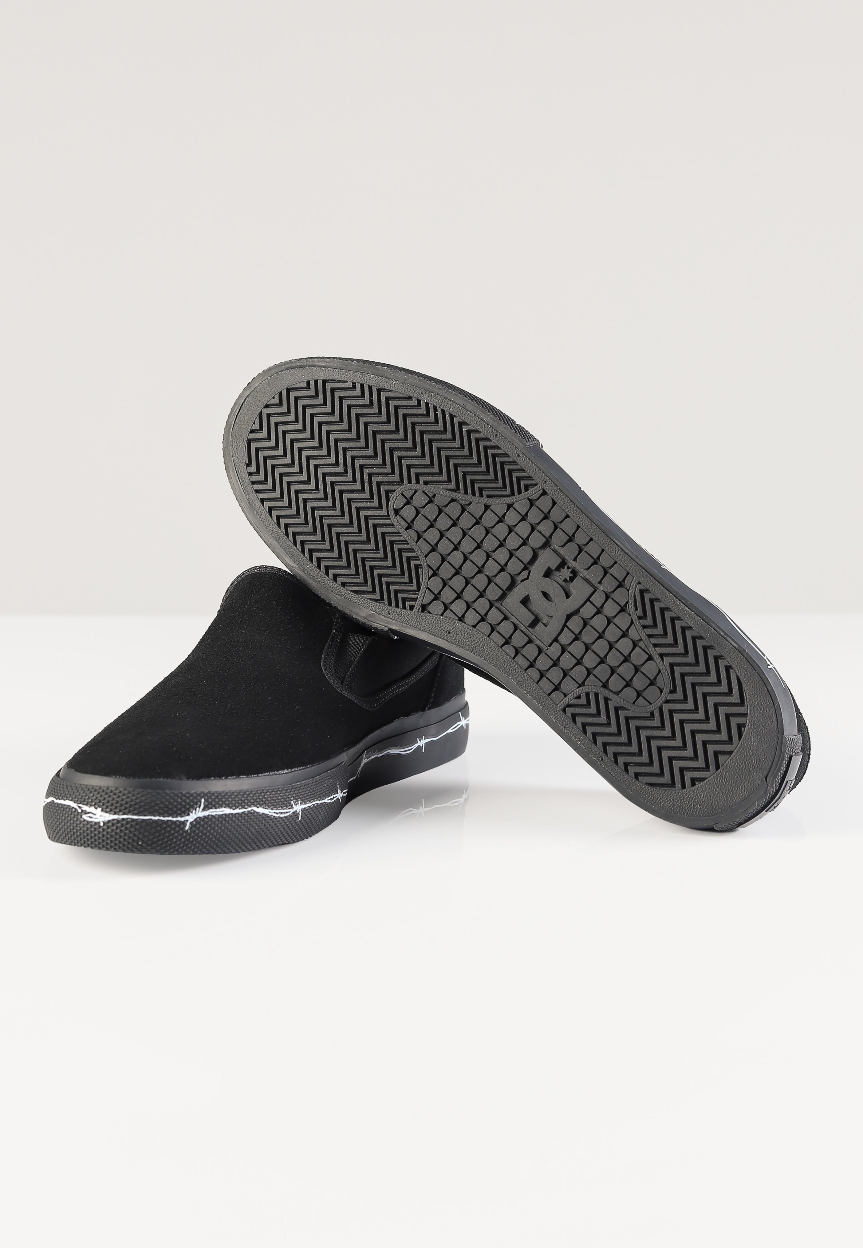 DC Manual Slip-On Black Print - Shoes | Impericon